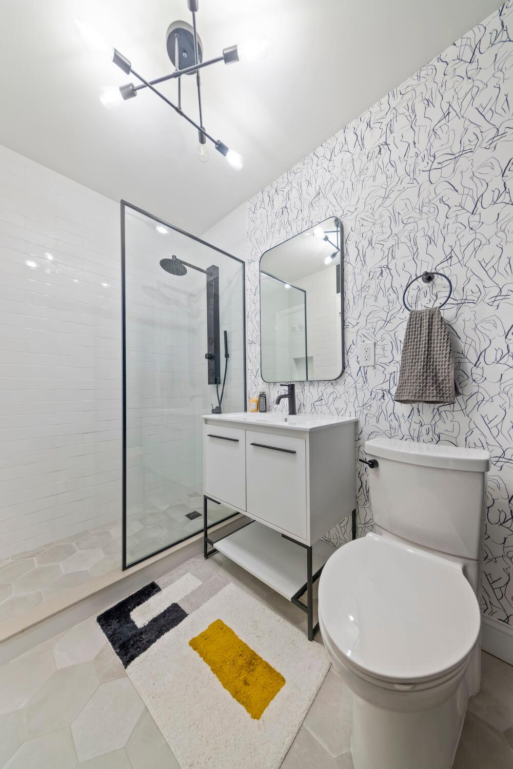 Remodeled shower with new tile and glass